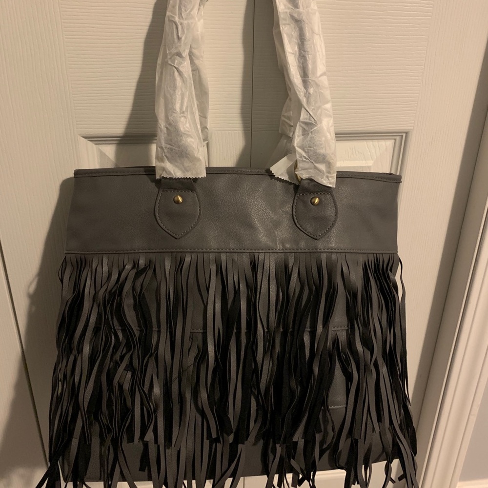 “mark.” Tassel Handbag